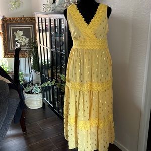 Yellow dress with a little gold spots on it new